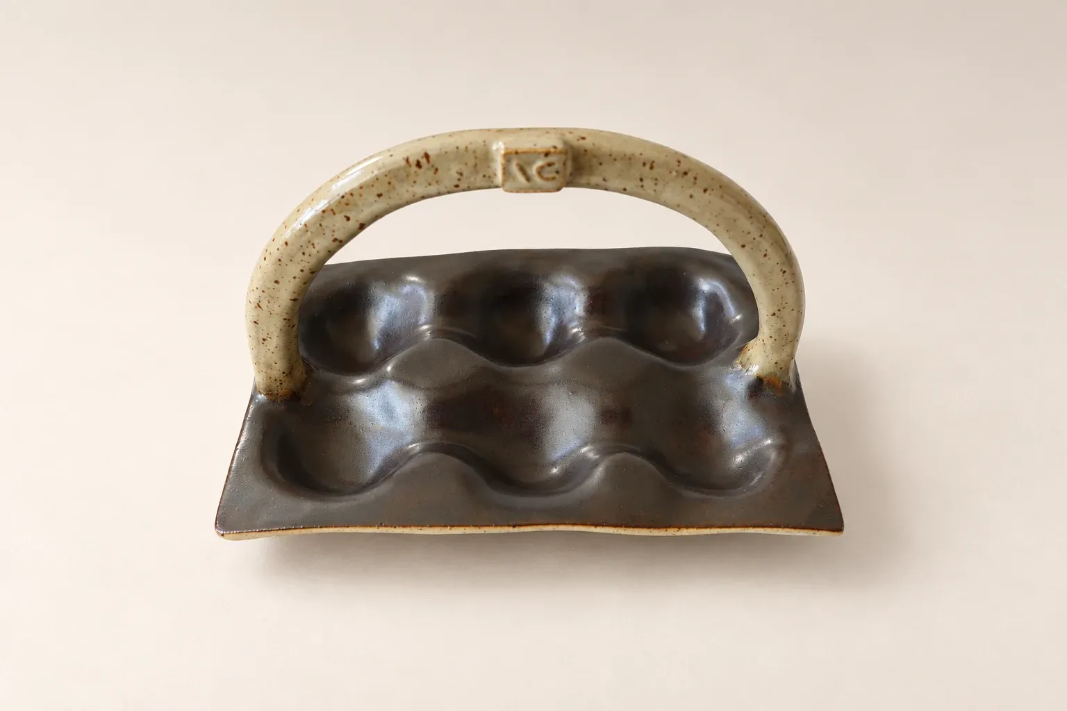 Dark glaze egg tray — handmade Kachi ceramic tableware